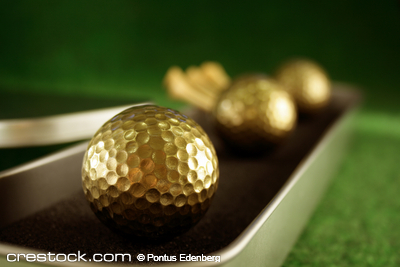 Golden golfballs in gift set for luxury play