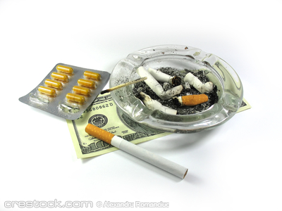 cigarette, money, ash-trash, and drugs isolate...